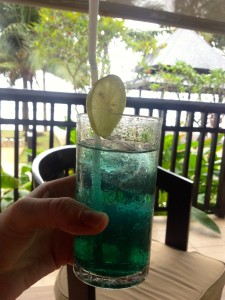 Free Welcome Cocktail!  It has Thai Whiskey, Lime, and something blue...