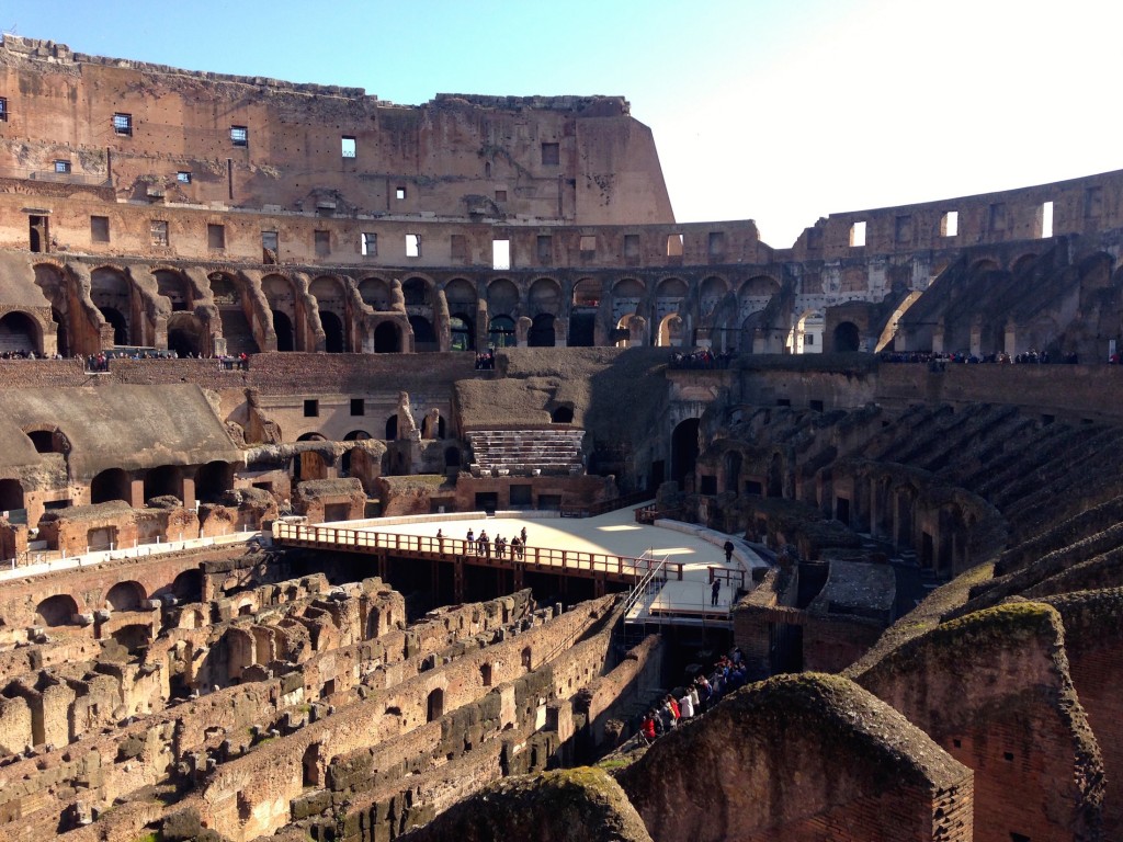 The Colosseum, where killing is a spectator sport. In this photo, you can see the underground passages where animals, prisoners, and gladiators moved around. It was covered with a wooden floor and sand when the Colosseum was actually in use.