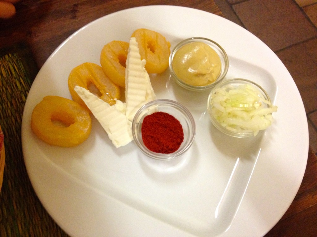 This is the cheese plate we ordered, which came with paprika, raw onions, butter, and mustard. It was the weirdest thing we ate in all of the Czech Republic.